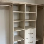 Arctic reach-in with matte nickel hardware and flat drawer fronts. Aspen, CO