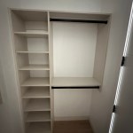 Arctic walk-in closet with black hardware. Carbondale, CO